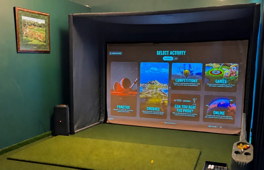 Trackman golf simulator bay with a turf hitting area at Bucktown Golf Club in Chicago