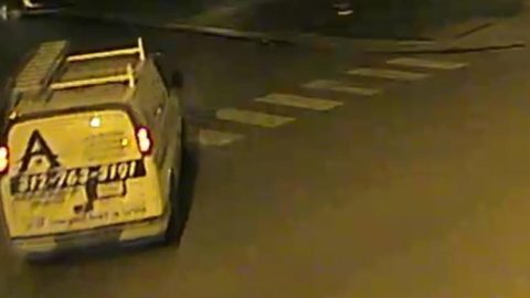 Surveillance footage shows a white cargo van that hit and killed a bicyclist in the West Garfield Park neighborhood late on Aug. 17, 2016. (Chicago Police Department)